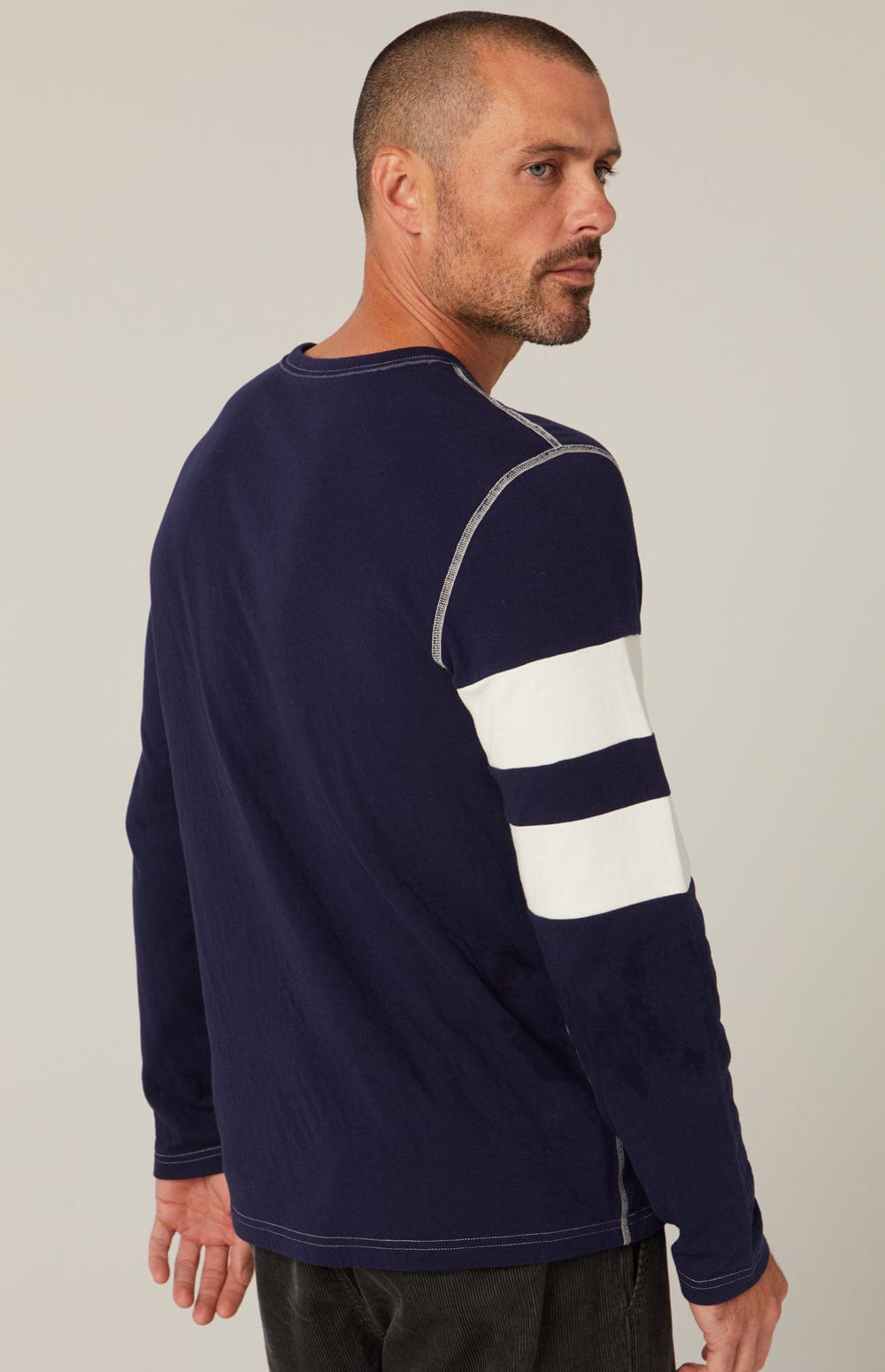 Helvetica Men's Crew by Alp N Rock, Men's Navy Shirt with White Stripes on the Arm and Grey Cross on Chest