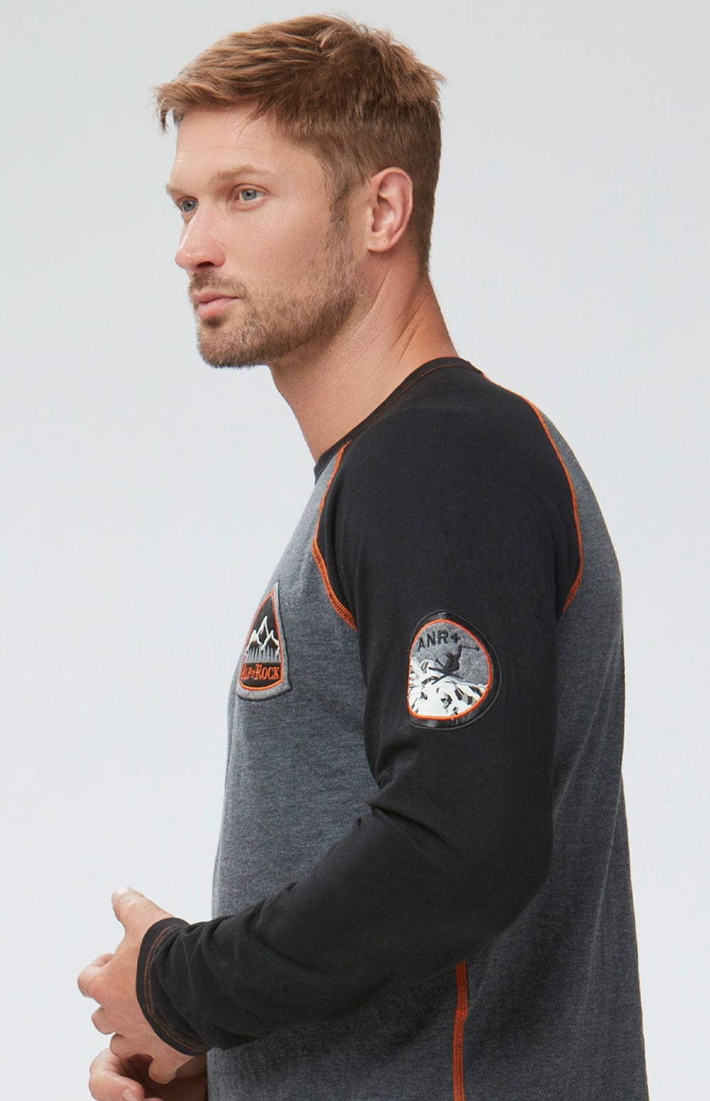 Powder Shirt by Alp N Rock, Men's Grey Long Sleeve Crew Neck Shirt with Black Sleeves, Orange Stitching, and Ski Patch
