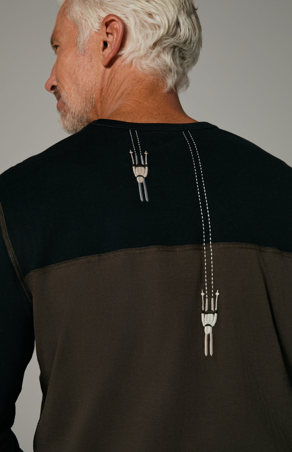 Alp N Rock Henry Crew, black and brown longsleeve crew neck for men with ski patch detail at chest