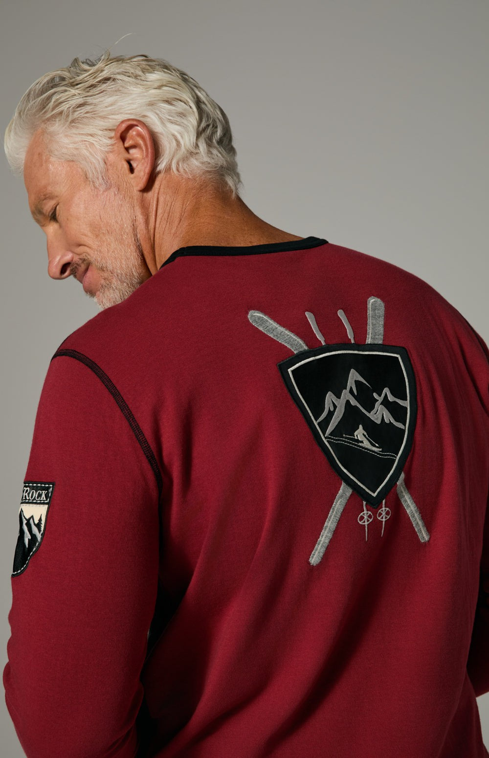 Alp N Rock Otis Crew, black and red longsleeve crew neck for men with embroidered skier details on front and back