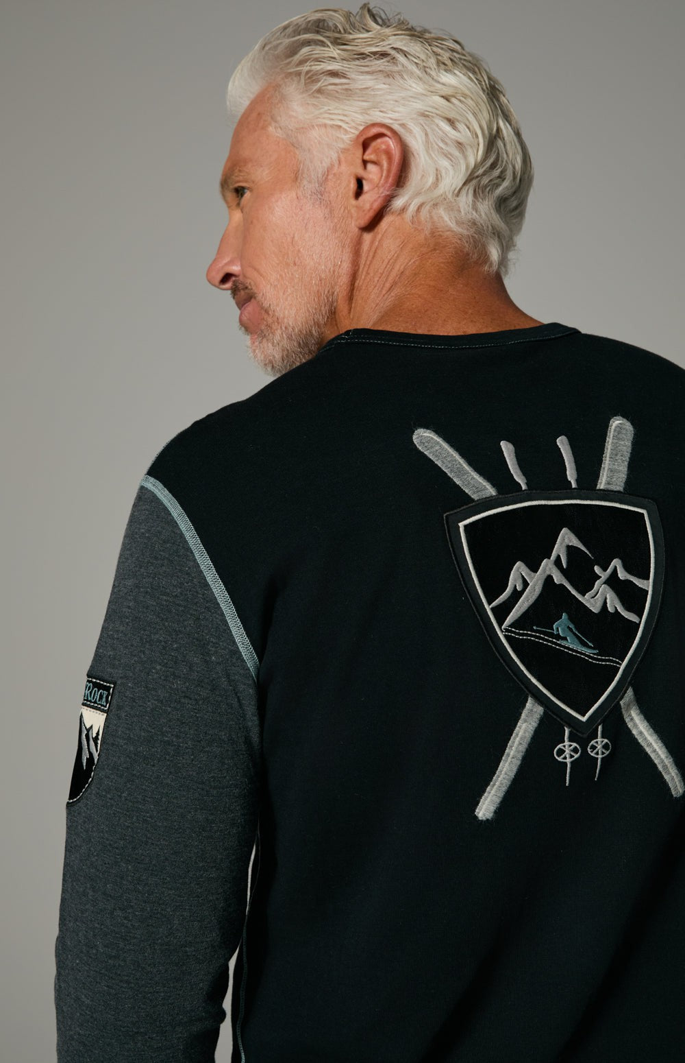 Alp N Rock Otis Crew, black and grey longsleeve crew neck for men with embroidered skier details on front and back