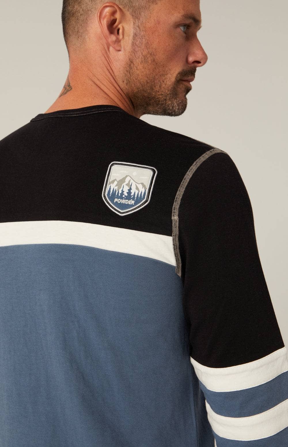 Downhill Crew by Alp N Rock, Men's Slate Blue Ski Crewneck Shirt with Black and White Stripes and Ski Patches