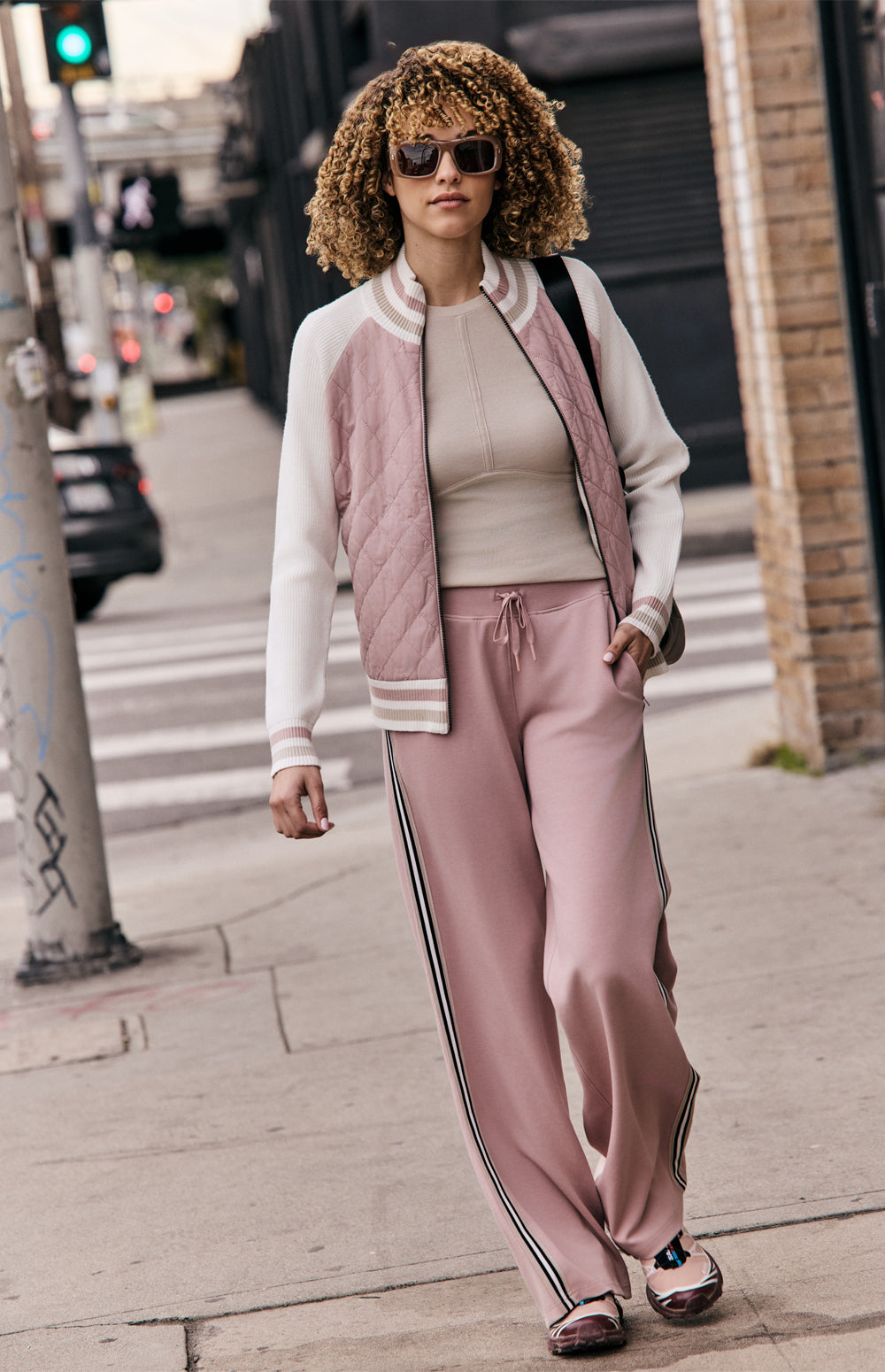 Alp N Rock Harlow Jacket, pink jacket for women with knit sleeves, stripe trim, and quilted body.