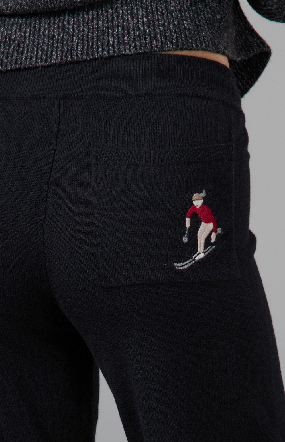 Alp N Rock Ahaana Skier Sweater Jogger, women's black knit jogger with embroidered skiier on back pocket