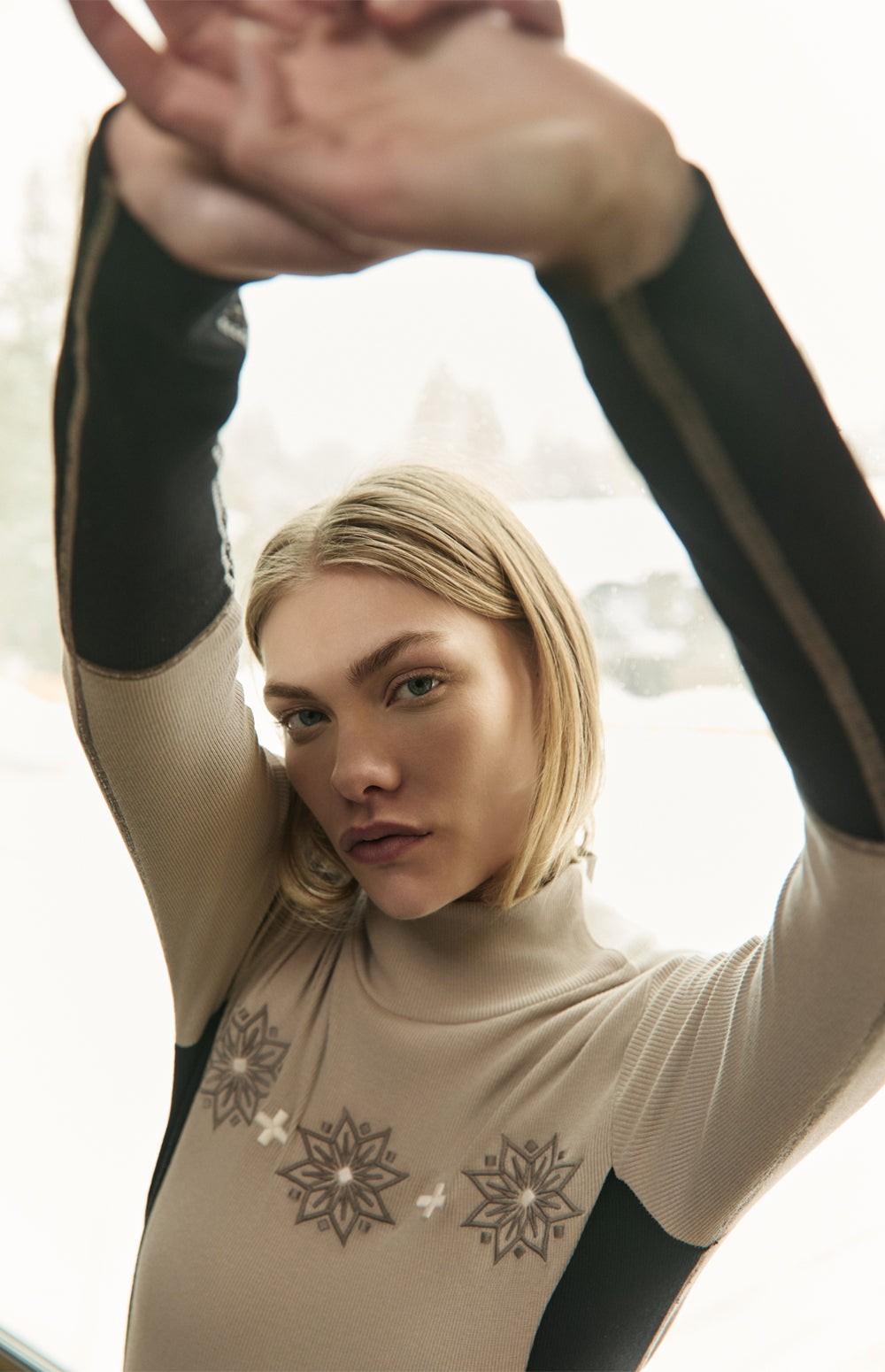 Alp N Rock Allison Mock Neck, beige colorblock mock neck top for women with embroidered snowflakes on the chest