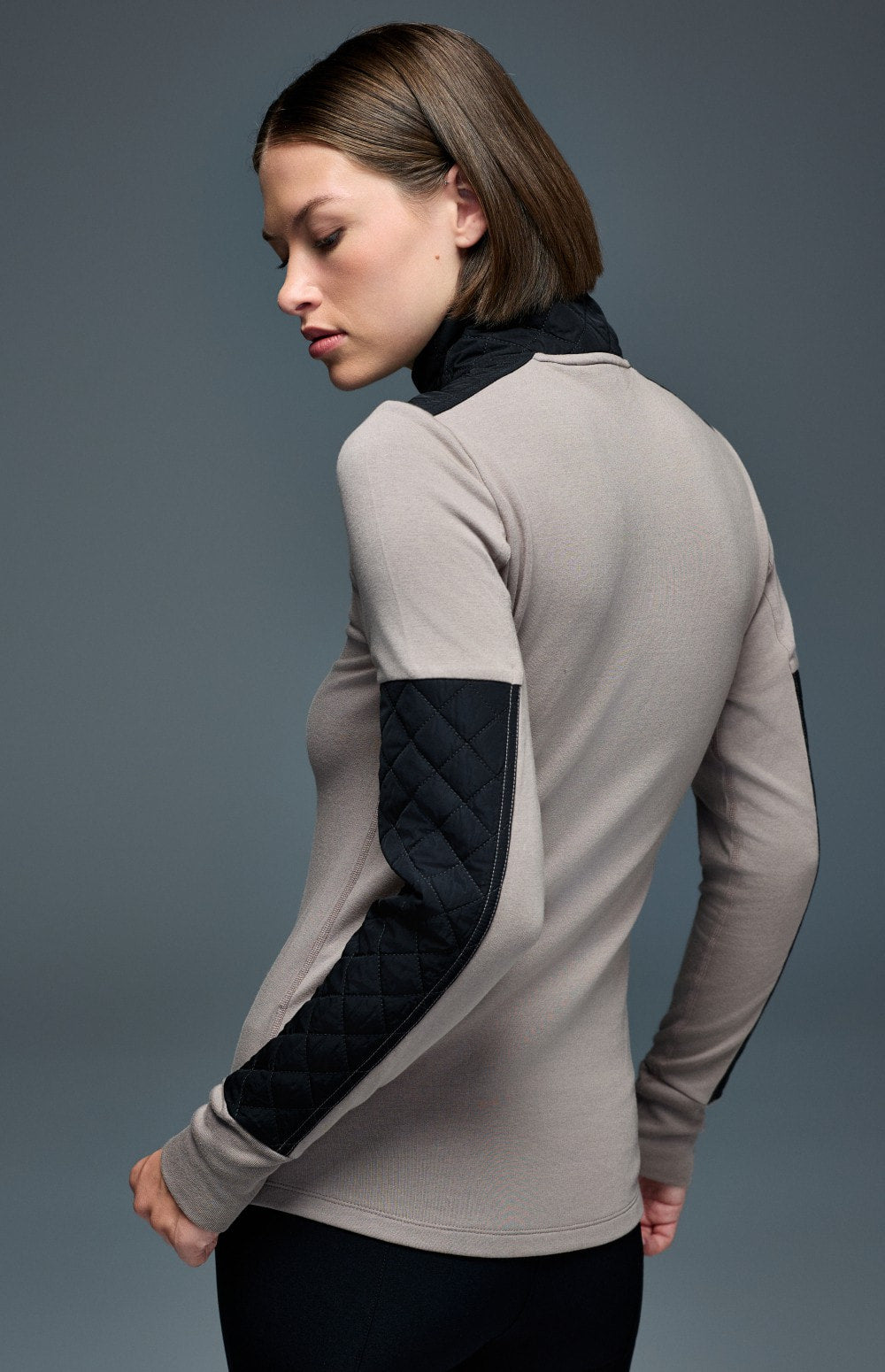 Alp N Rock Cody, taupe mock neck longsleeve shirt with black quilting at the neckline and sleeves