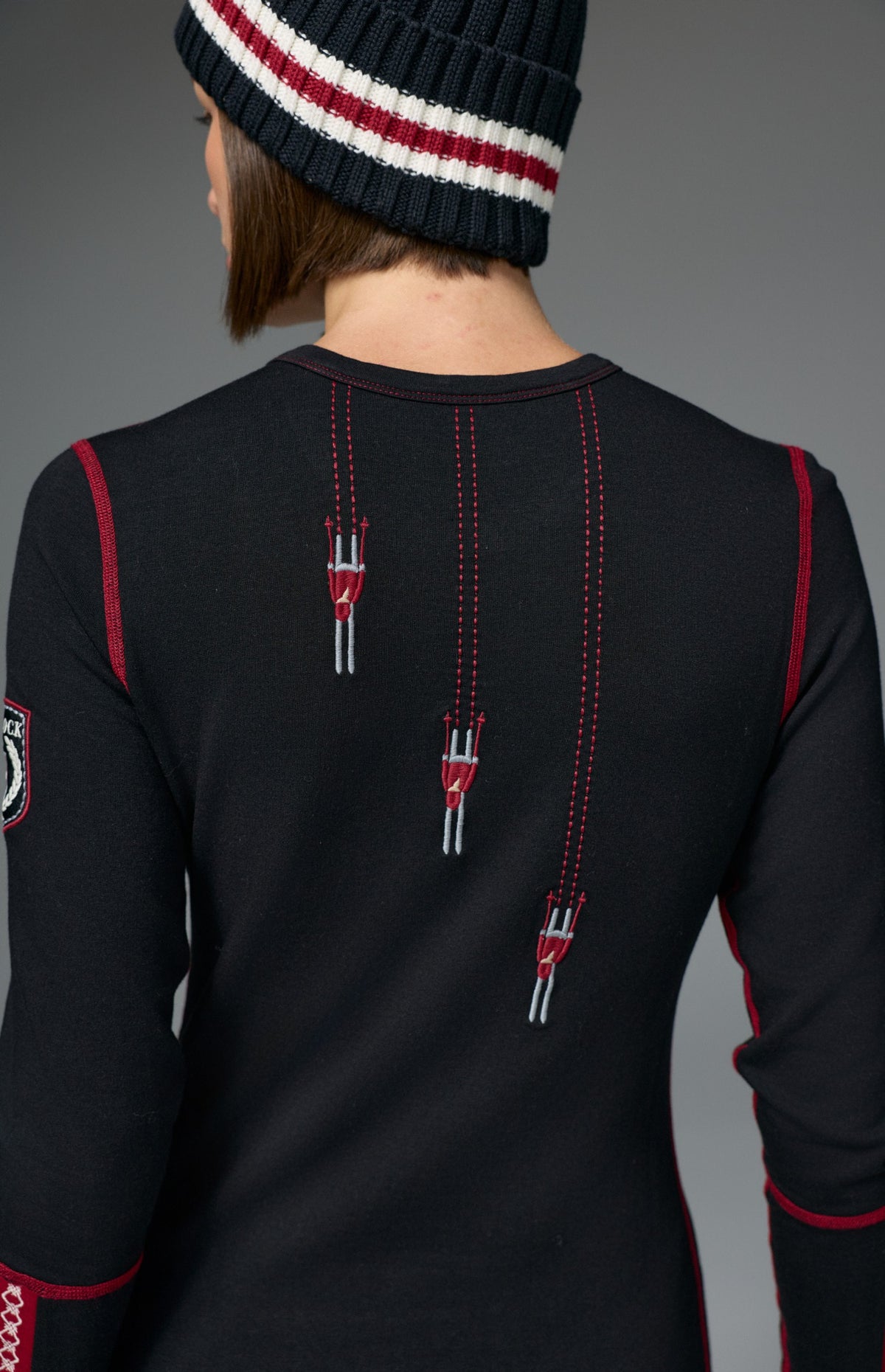 Alp N Rock Davos Ski Crew, black longsleeve ski crew with red Davos lettering on chest and embroidered