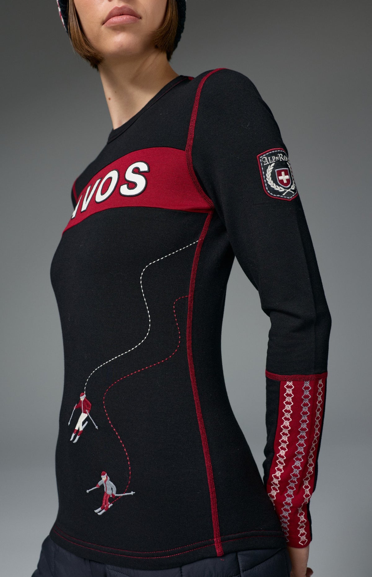 Alp N Rock Davos Ski Crew, black longsleeve ski crew with red Davos lettering on chest and embroidered