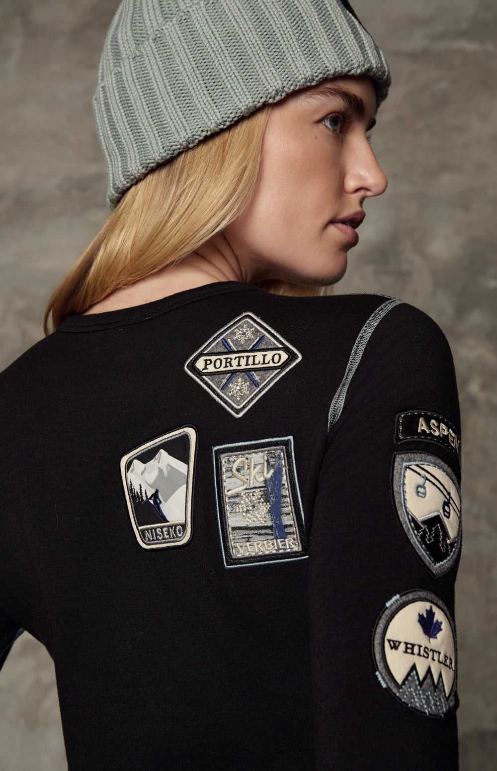 Alp N Rock Jet Setter Crew, black longsleeve crewneck top for women adorned with ski resort patches