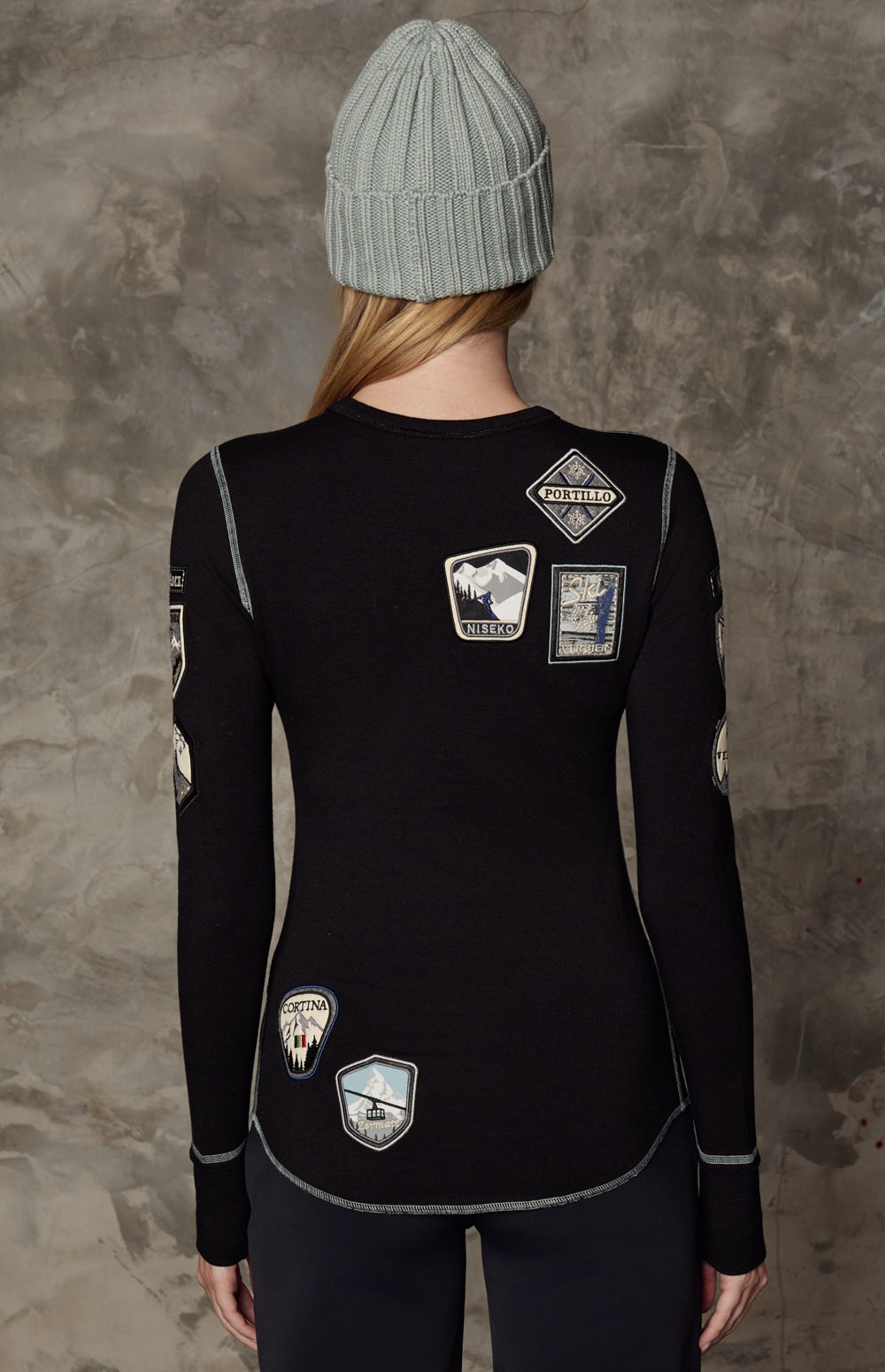 Alp N Rock Jet Setter Crew, black longsleeve crewneck top for women adorned with ski resort patches