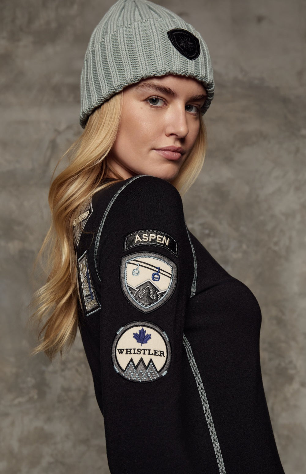 Alp N Rock Jet Setter Crew, black longsleeve crewneck top for women adorned with ski resort patches