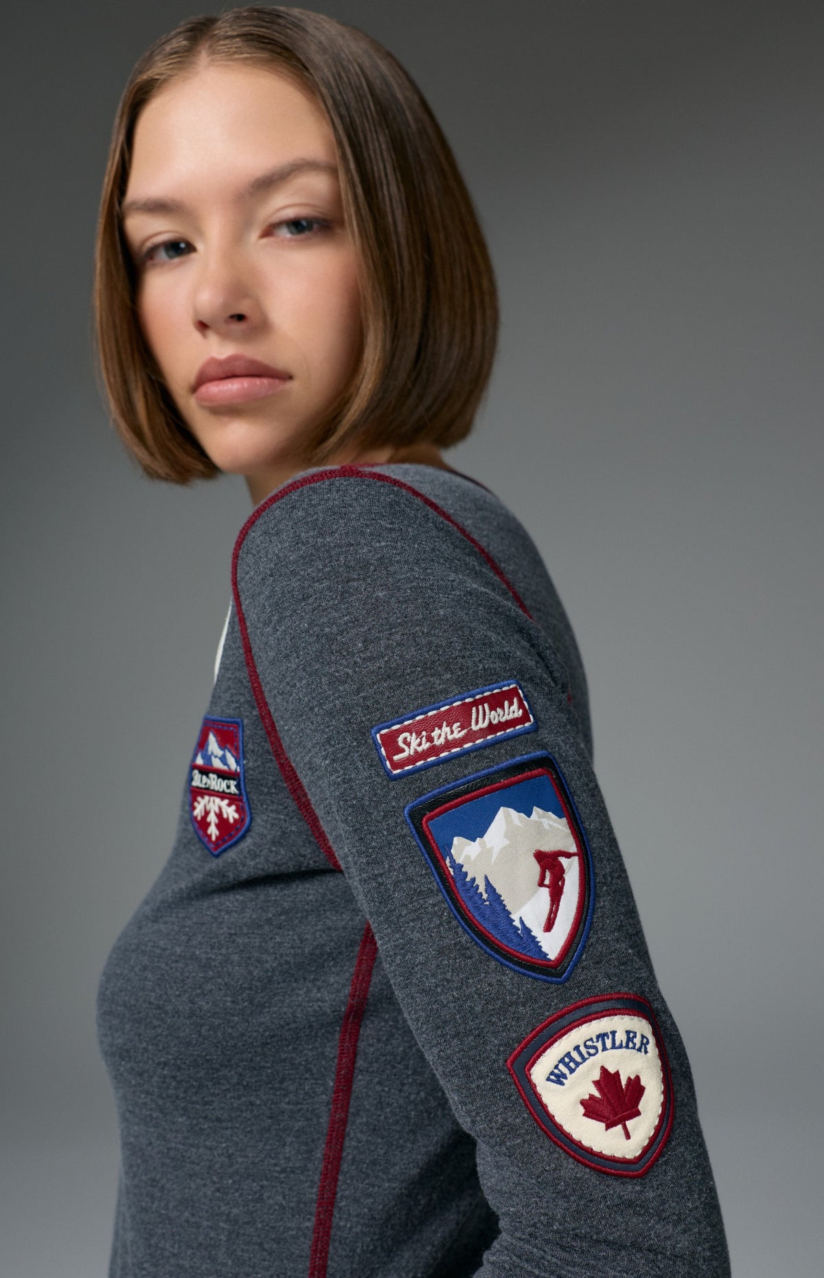 Alp N Rock Ski The World Henley Shirt, women's black henley shirt with embroidered ski patches all over
