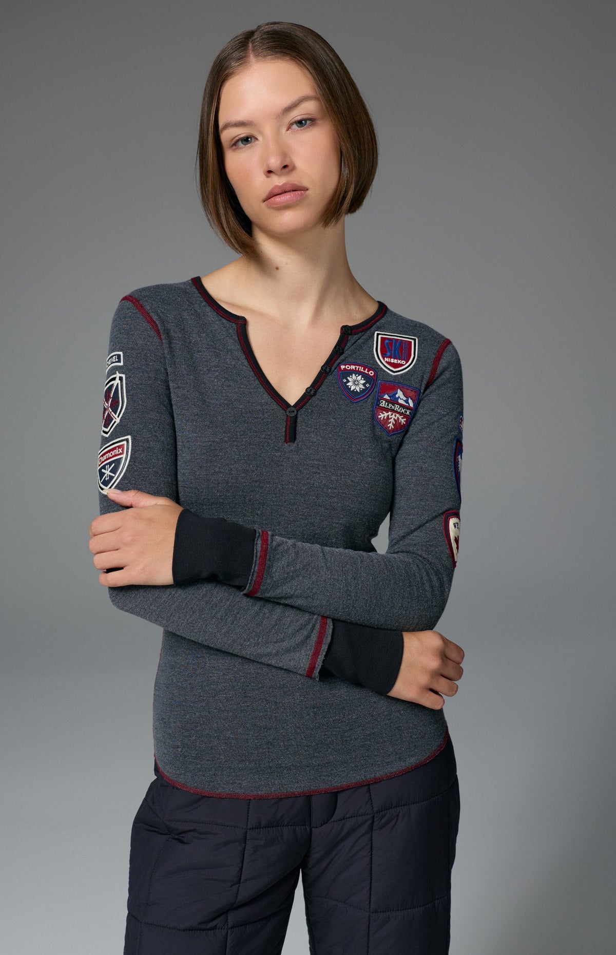 Alp N Rock Ski The World Henley Shirt, women's black henley shirt with embroidered ski patches all over