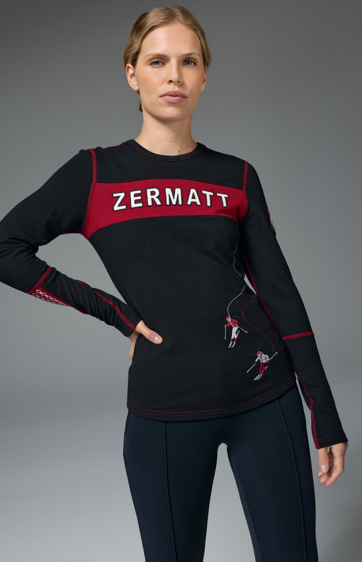 Alp N Rock Zermatt Ski Crew, women's black and red longsleeve ski crew with embroidered skiers and Zermatt lettering on chest