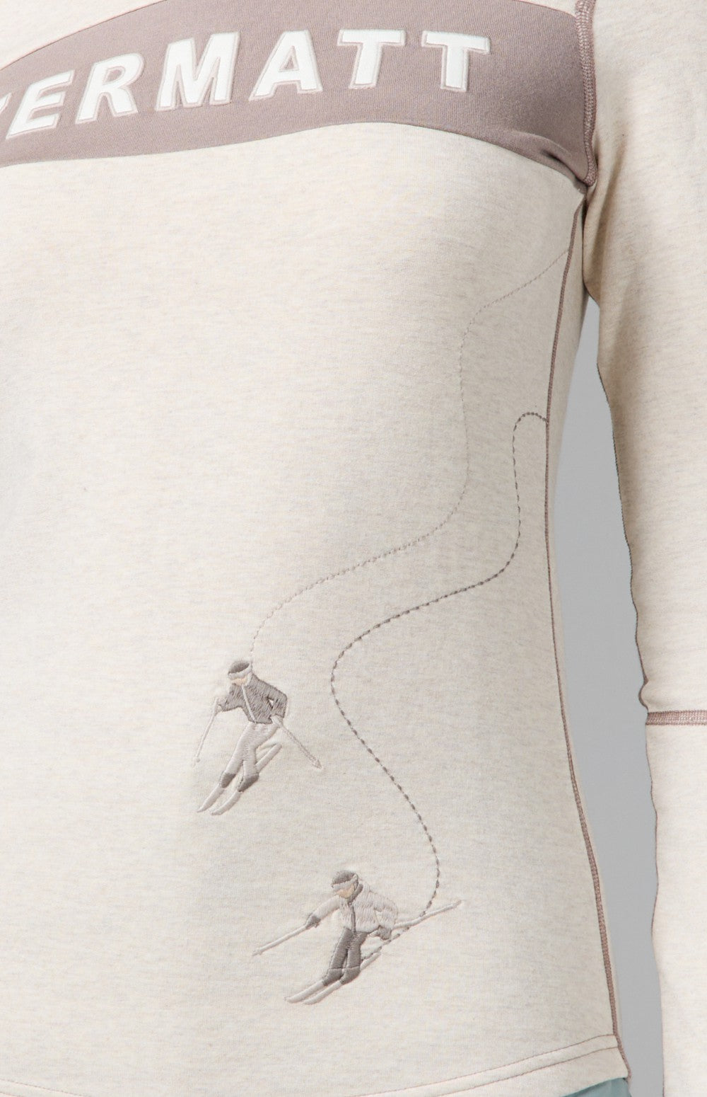 Alp N Rock Zermatt Ski Crew, women's white and taupe longsleeve ski crew with embroidered skiers and Zermatt lettering on chest