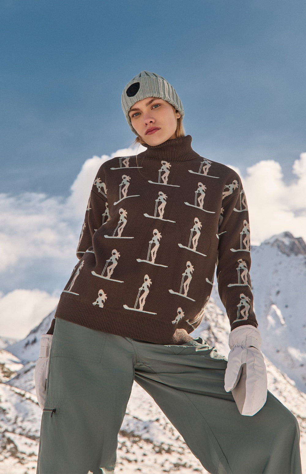 Alp N Rock Nala Sweater, dark brown turtleneck ski sweater for women with pink skier pattern all over