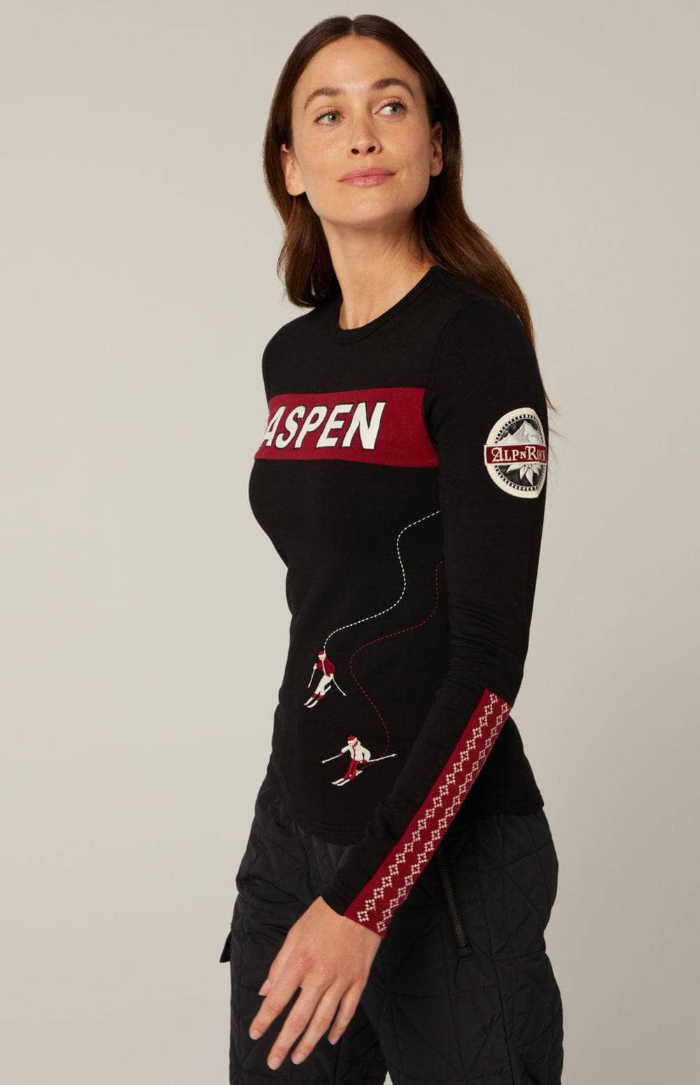 Aspen Ski Crewneck Top by Alp N Rock, Women's Black Long Sleeve Shirt with Aspen on Chest and Embroidered Skiers on Back