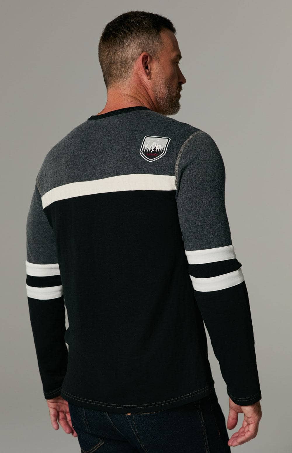 Downhill Crew by Alp N Rock, Men's Black Ski Shirt with Grey Panels and White Stripes and Arm Patch