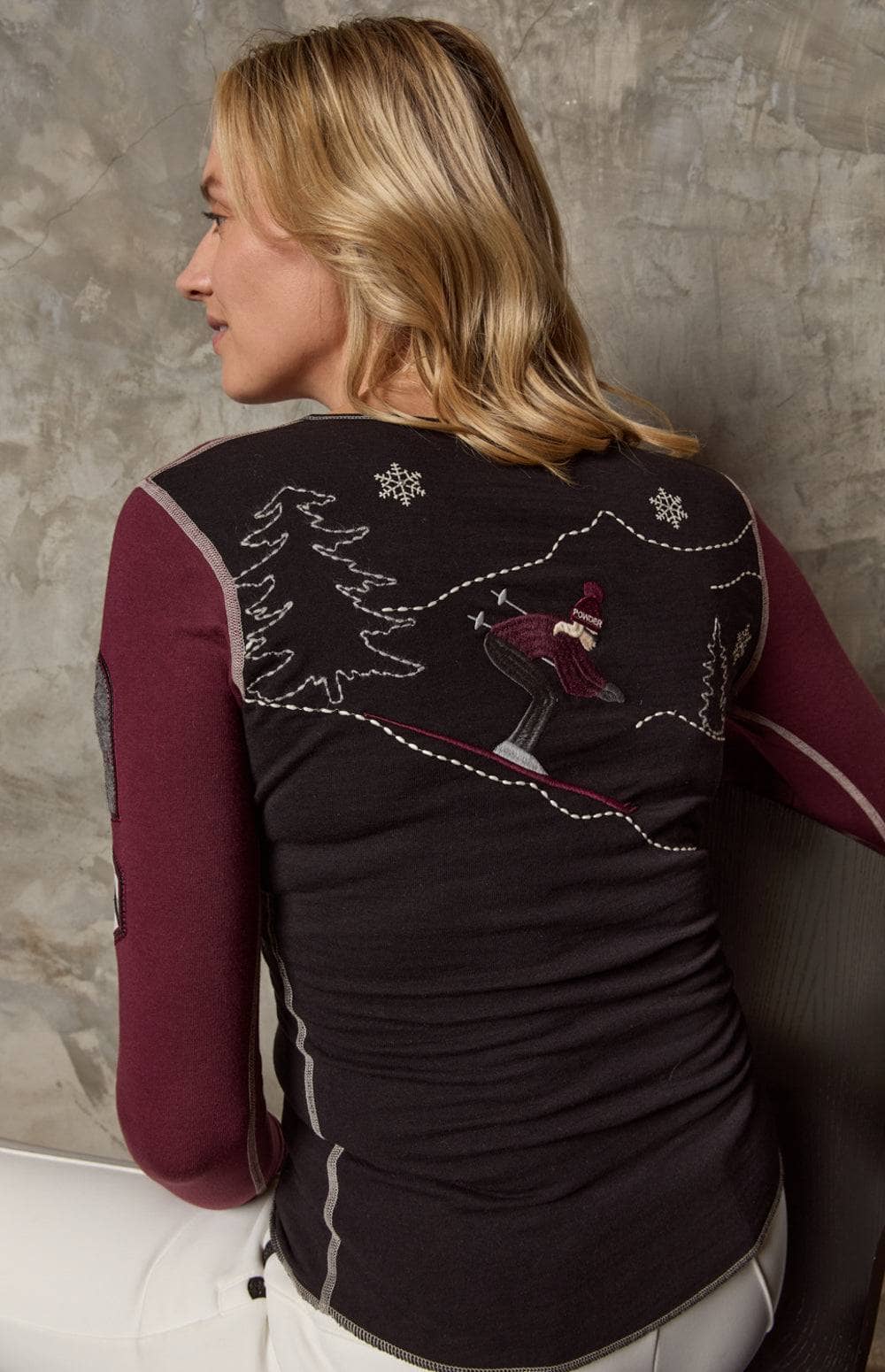 Rassa Henley Shirt by Alp N Rock, Women's Black and Burgundy Long Sleeve Henley Shirt with Ski Patches and Embroidered Ski Design on Back