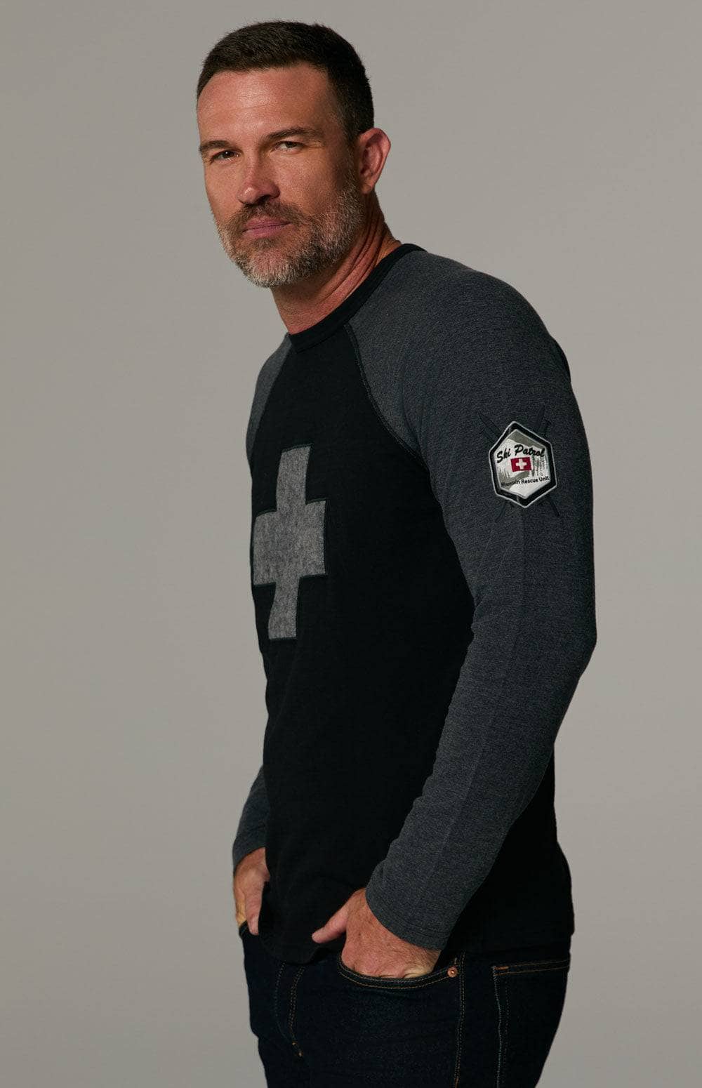 Ski Patrol Crew by Alp N Rock, Men's Longsleeve Black Crewneck Ski Shirt with Grey Sleeves and Cross on Chest