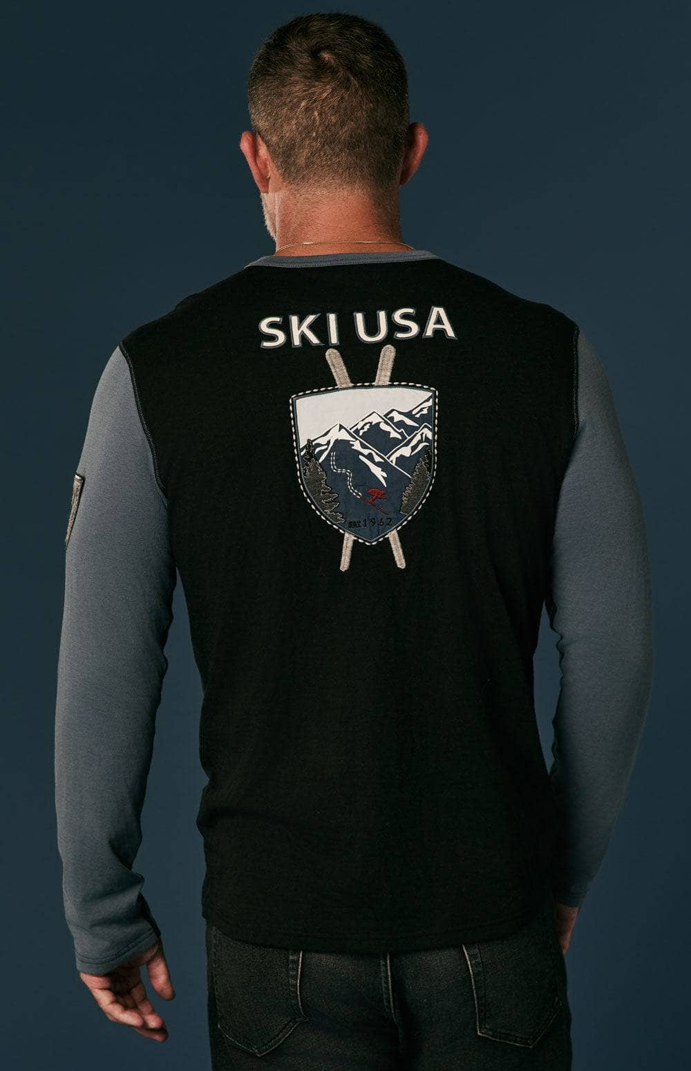 USA Ski 1962 Crew by Alp N Rock, Men's Slate Blue Ski Henley With Ski Patches On Front, Arm, and Back