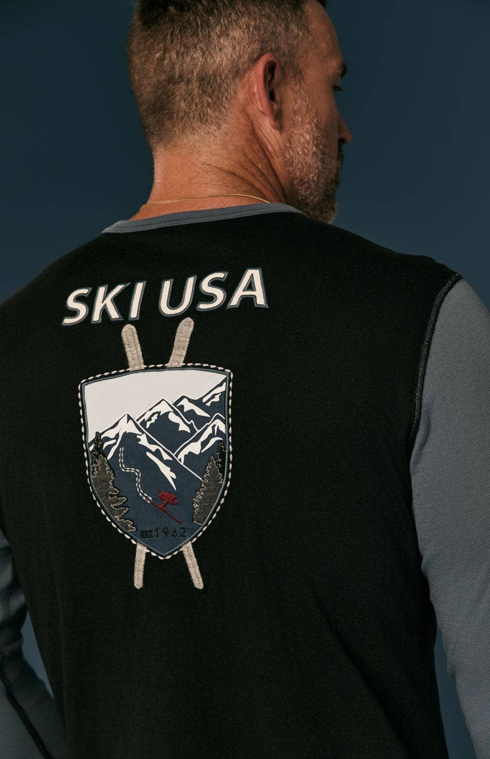 USA Ski 1962 Crew by Alp N Rock, Men's Slate Blue Ski Henley With Ski Patches On Front, Arm, and Back