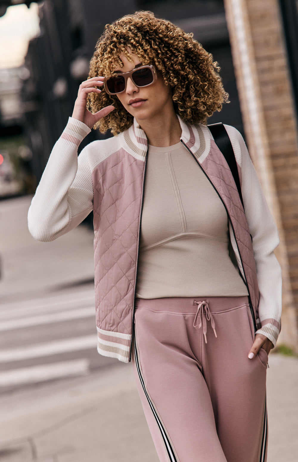 Alp N Rock Harlow Jacket, pink jacket for women with knit sleeves, stripe trim, and quilted body.