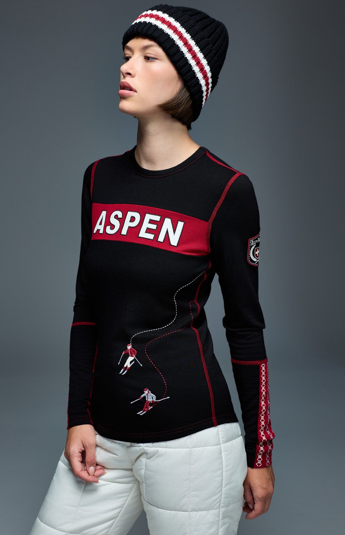 Alp N Rock Aspen Ski Crew, black longsleeve ski crew with red aspen lettering on chest and embroidered skiers