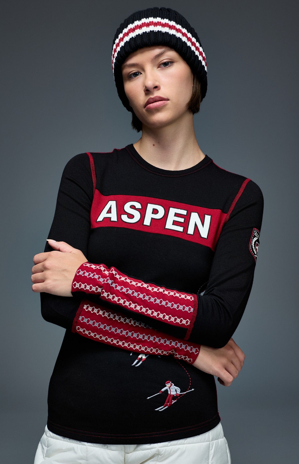 Alp N Rock Aspen Ski Crew, black longsleeve ski crew with red aspen lettering on chest and embroidered skiers