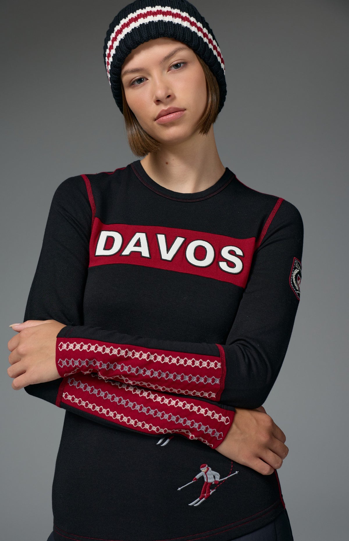 Alp N Rock Davos Ski Crew, black longsleeve ski crew with red Davos lettering on chest and embroidered 