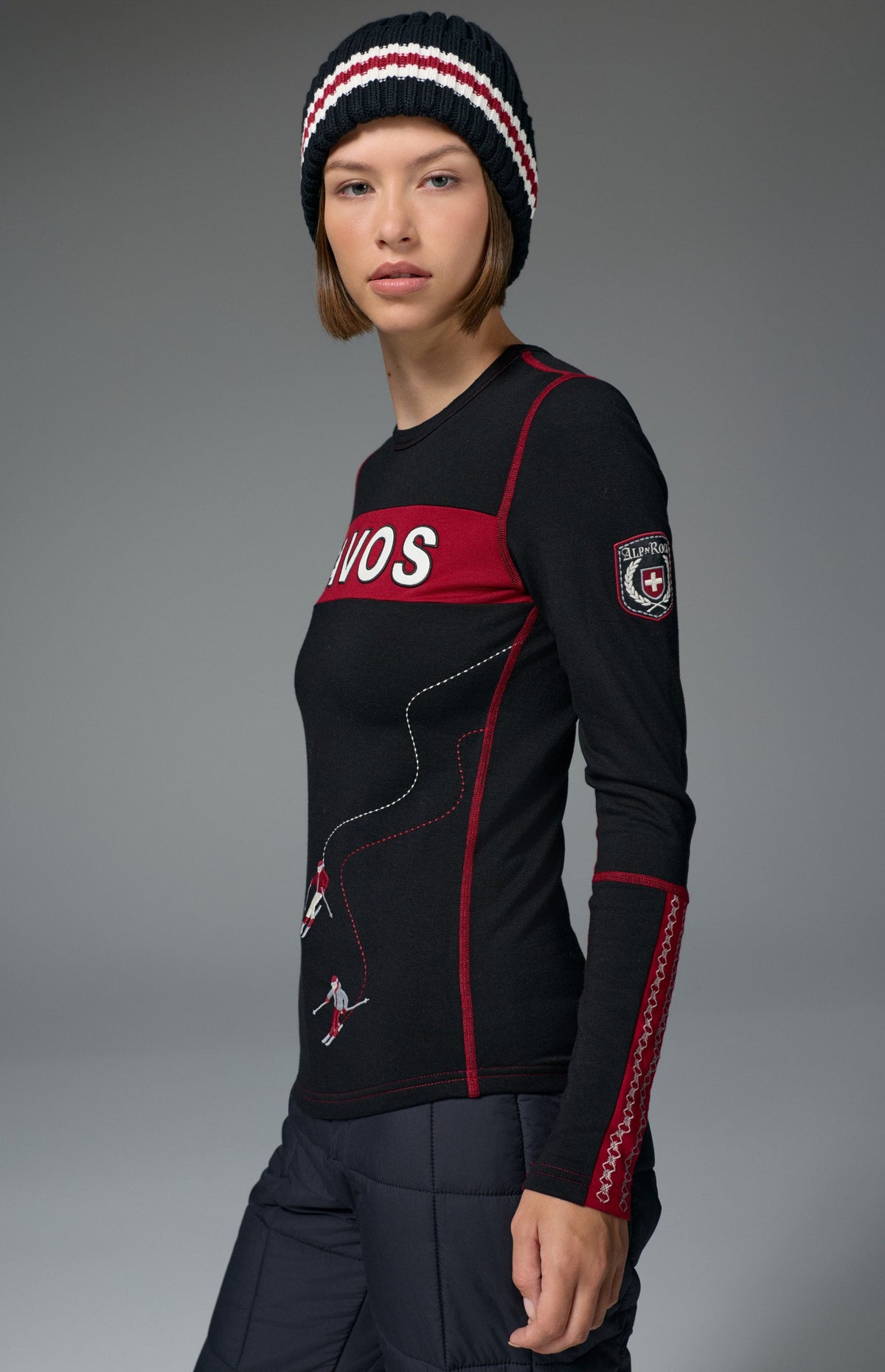 Alp N Rock Davos Ski Crew, black longsleeve ski crew with red Davos lettering on chest and embroidered 