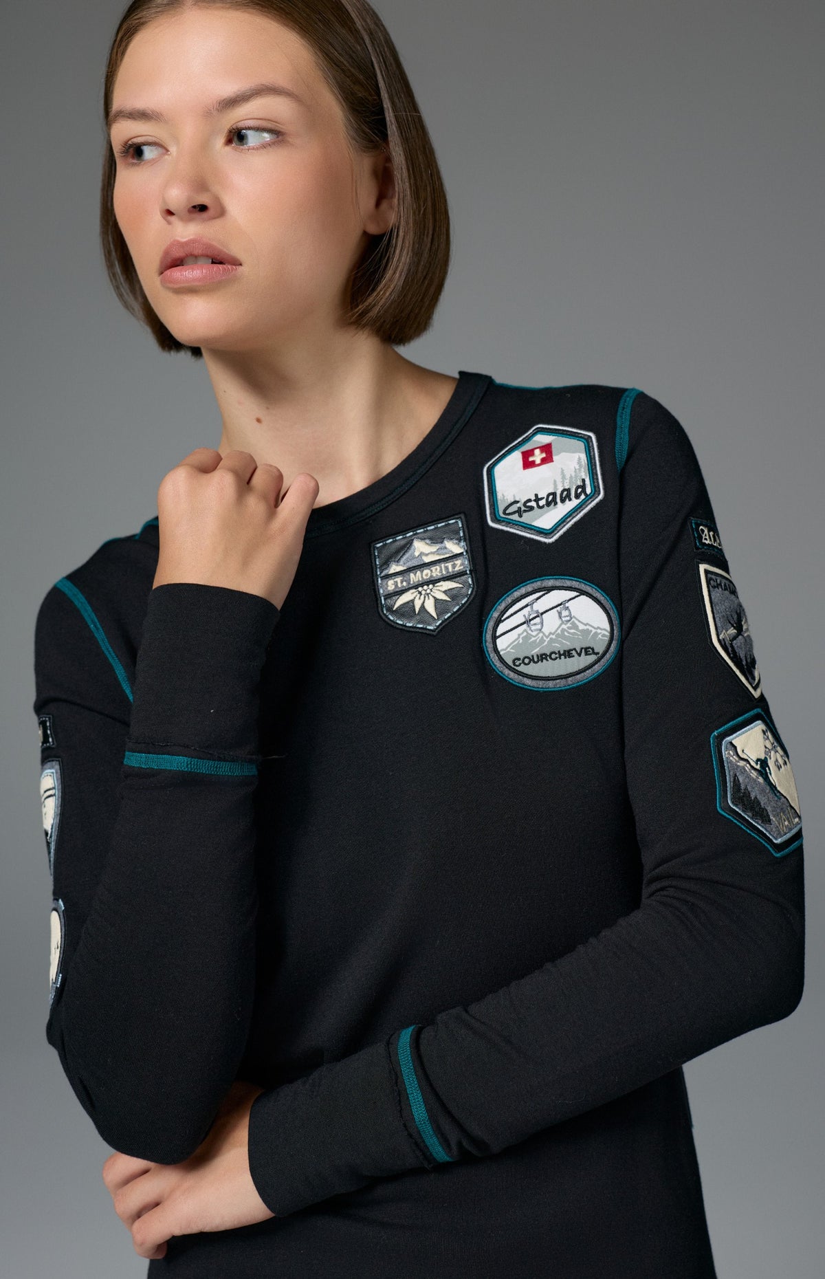 Alp N Rock Jet Setter Crew, women's black and blue ski longsleeve with embroidered patches all over