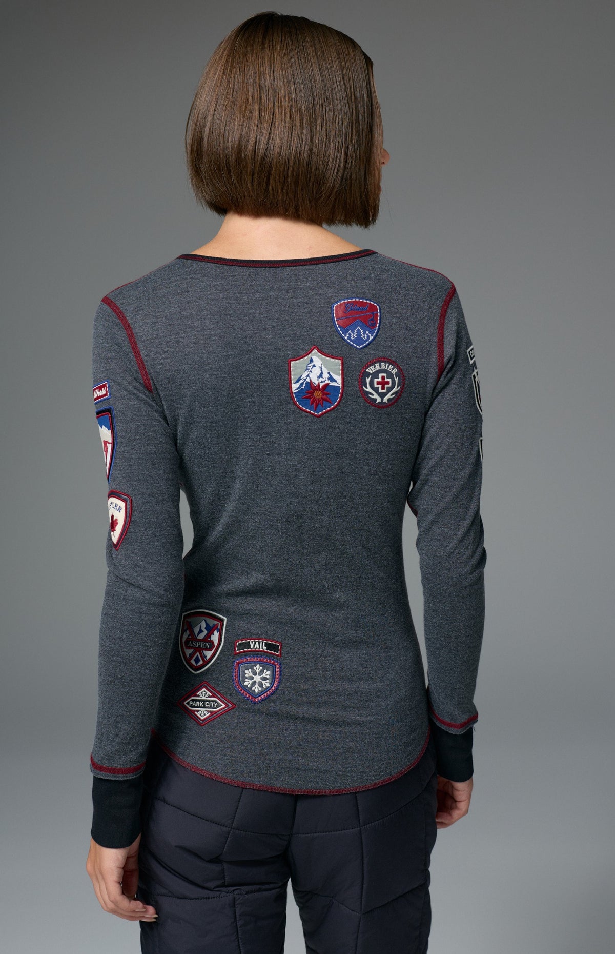 Alp N Rock Ski The World Henley Shirt, women's black henley shirt with embroidered ski patches all over