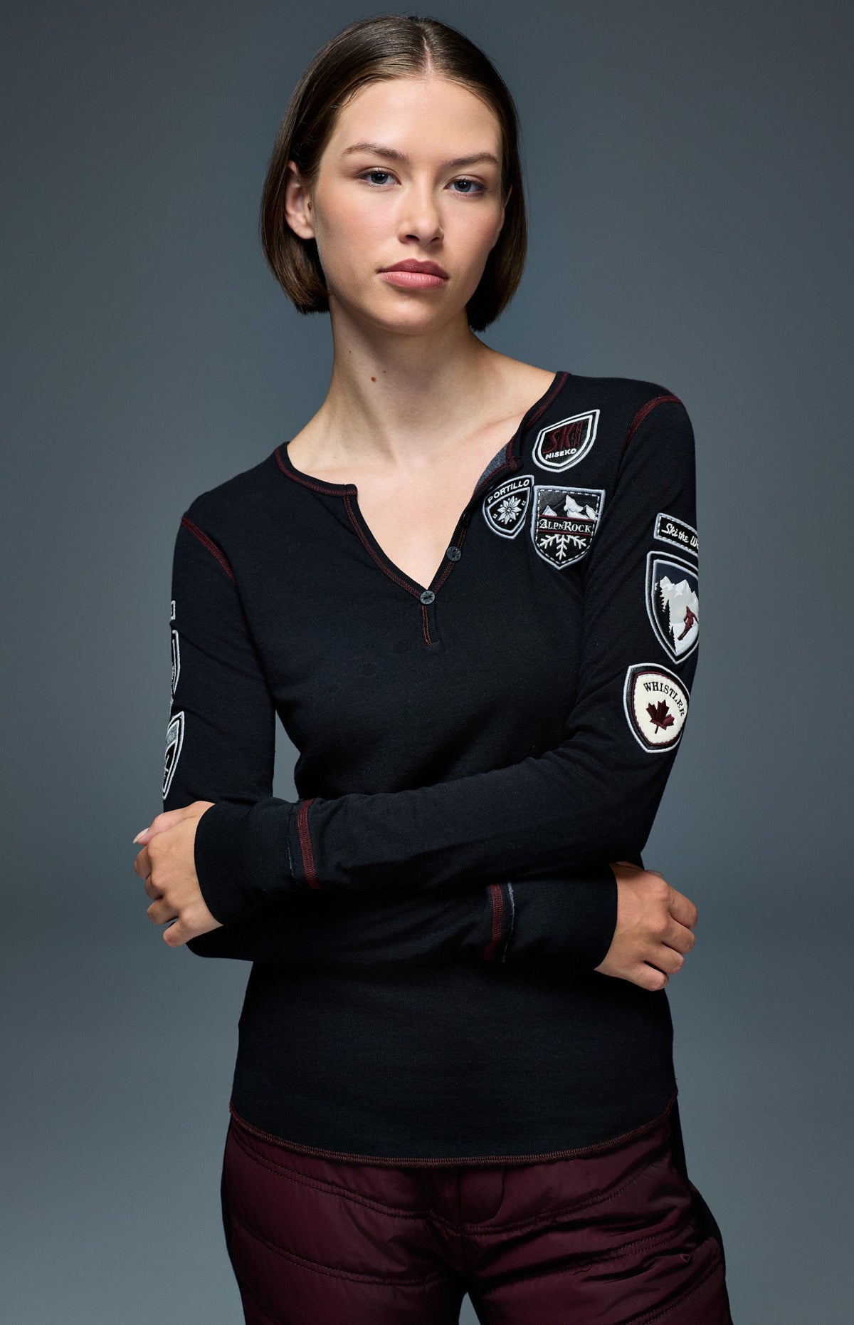 Alp N Rock Ski The World Henley Shirt, women's black henley shirt with embroidered ski patches all over