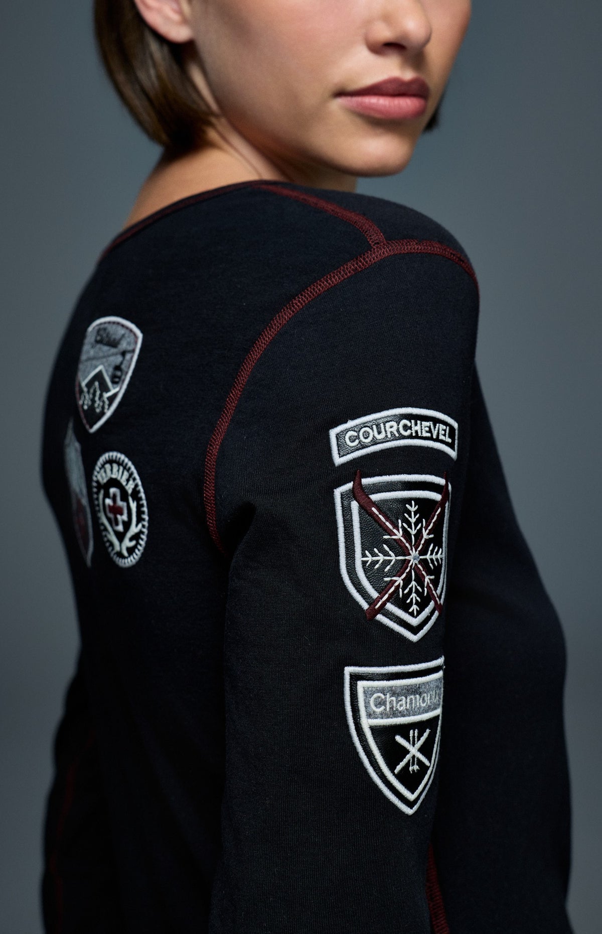 Alp N Rock Ski The World Henley Shirt, women's black henley shirt with embroidered ski patches all over