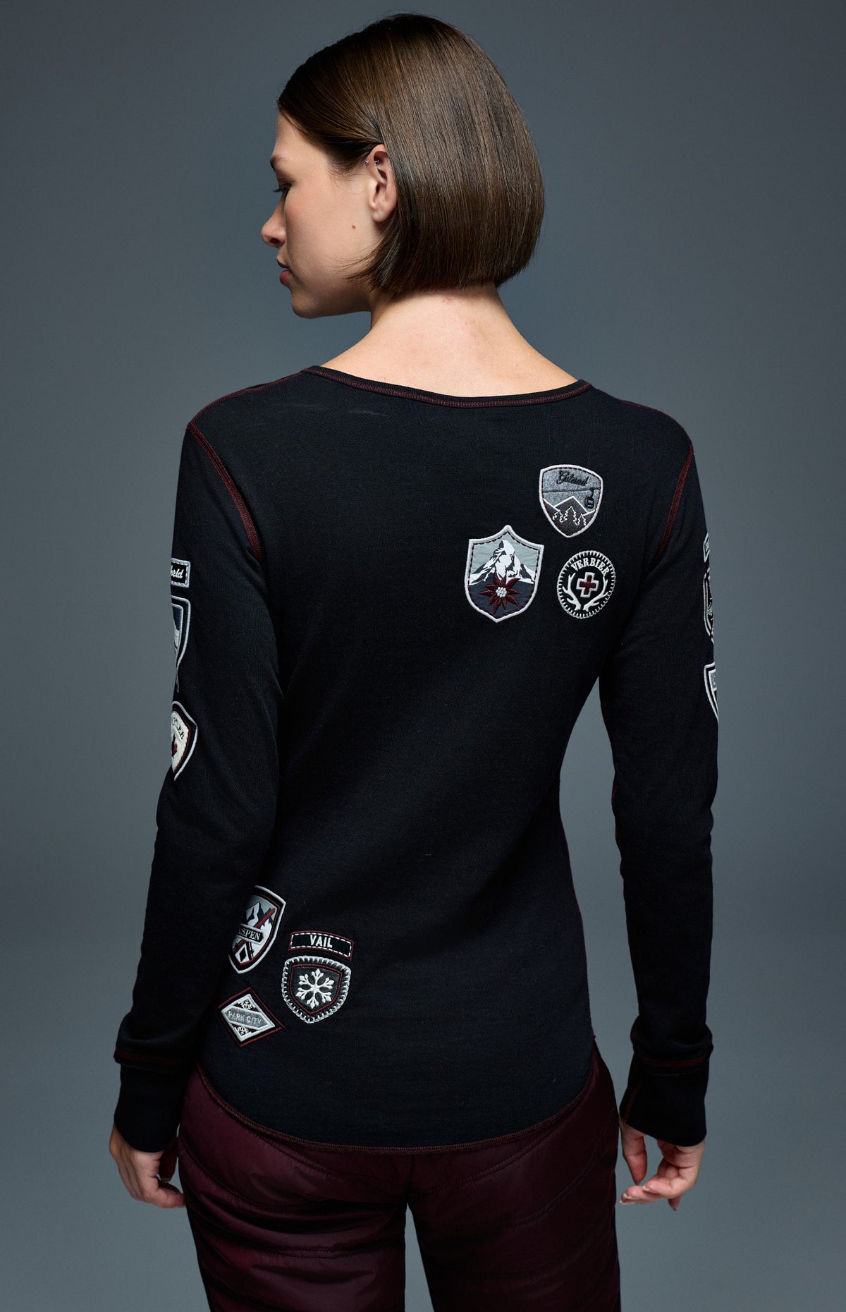Alp N Rock Ski The World Henley Shirt, women's black henley shirt with embroidered ski patches all over