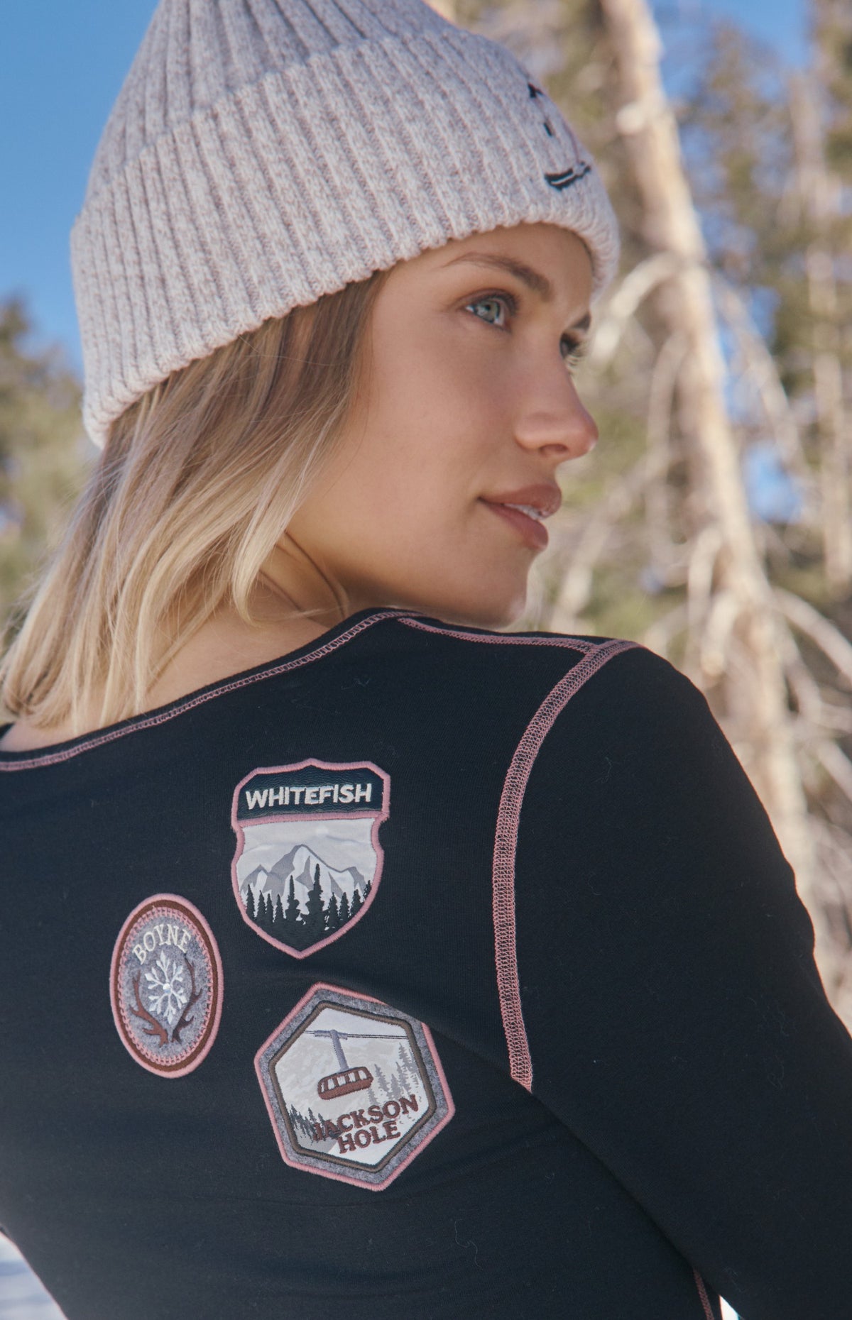 Alp N Rock USA Resorts Henley Shirt, black longsleeve henley shirt with pink lining and ski patches all over