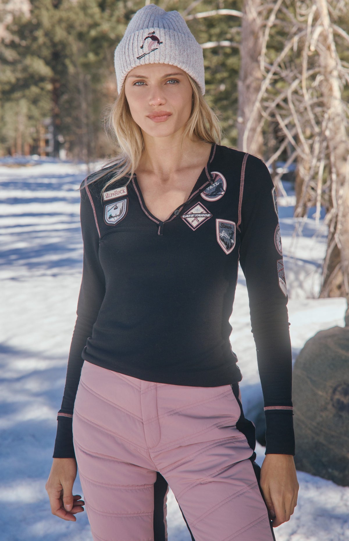 Alp N Rock USA Resorts Henley Shirt, black longsleeve henley shirt with pink lining and ski patches all over
