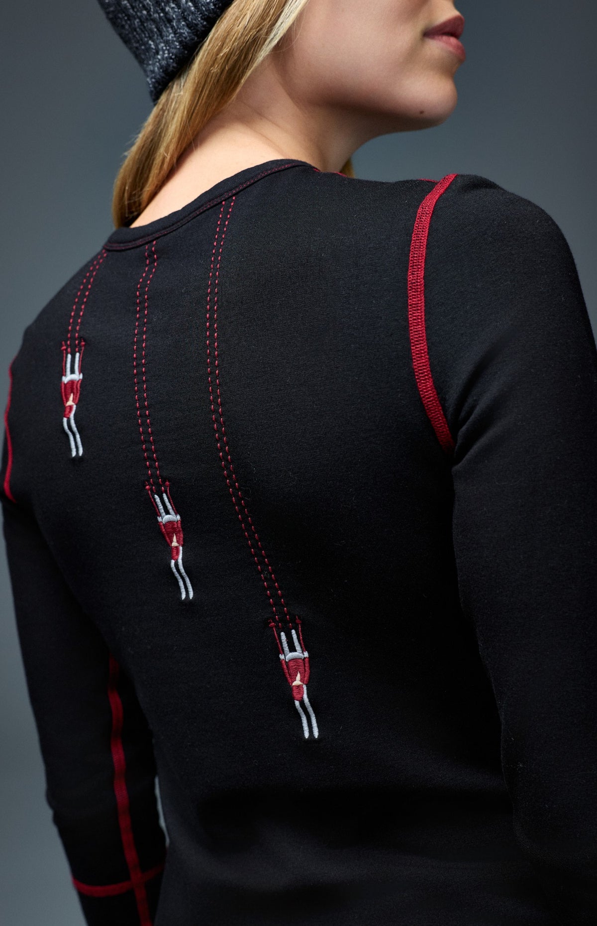 Alp N Rock Vail Ski Crew, black and red longsleeve ski shirt for women with embroidered skiers and Vail lettering