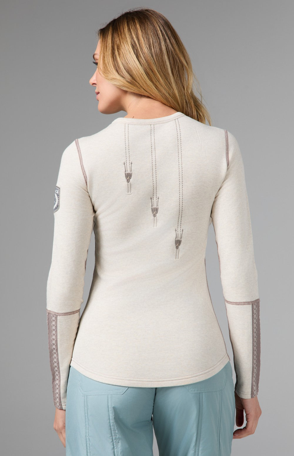 Alp N Rock Zermatt Ski Crew, women's white and taupe longsleeve ski crew with embroidered skiers and Zermatt lettering on chest